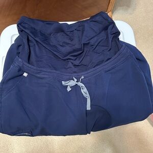 Navy blue FIGS maternity jogger style scrubs